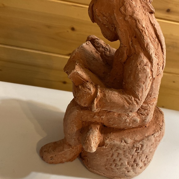 Local artist clay girl reading. - Picture 5 of 7